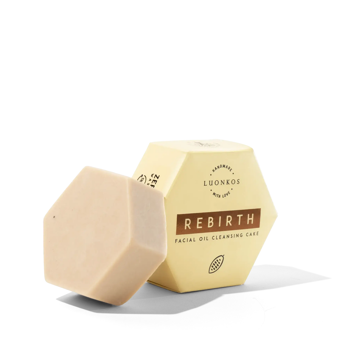 Rebirth facial oil cleansing cake with natural ingredients for gentle oil cleansing and skin brightening.