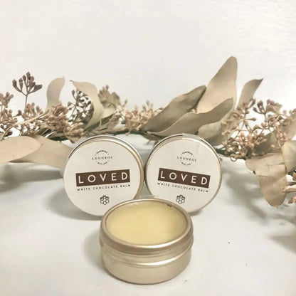 Loved hoitava balsami white chocolate balm in small tins for lips and skin care packed in a 2-pack set