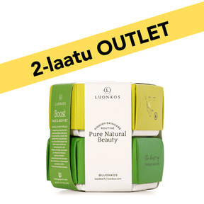 Luonkos Face & Body Boost Set with Infinity facial cleansing oil bar and Vitality body oil bar in eco-friendly green packaging.