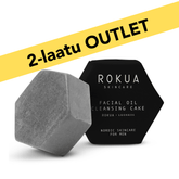 Rokua x Luonkos facial oil cleansing cake for men with charcoal, rosemary, and palmarosa essential oils, natural skincare product in black hexagonal packaging.