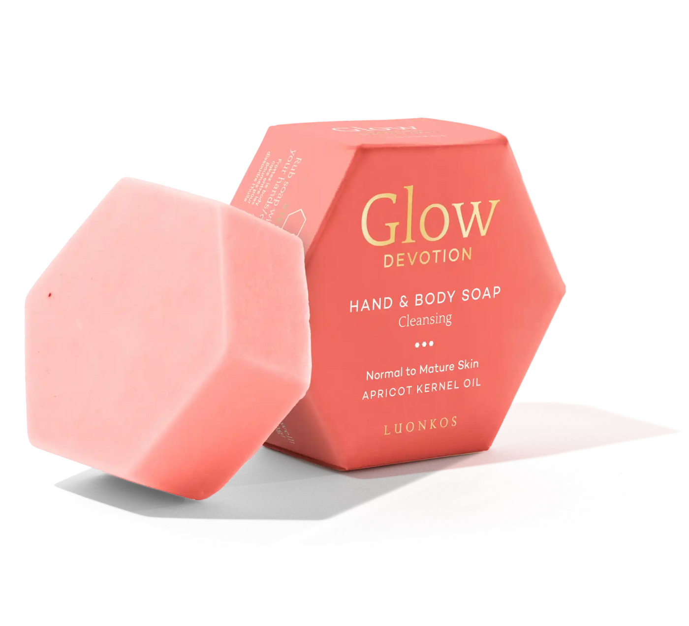pink hexagonal Luonkos Glow Devotion hand and body soap bar with matching box featuring apricot kernel oil for normal to mature skin, natural vegan formula